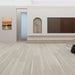NAF AquaPlus Platinum Soho 9mm waterproof rigid core vinyl plank flooring with realistic wood grain and deep-textured finish in a living room