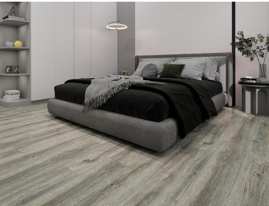 NAF AquaPlus Platinum Virgo 9mm waterproof rigid core vinyl plank flooring with realistic wood grain and deep-textured finish in a bedroom