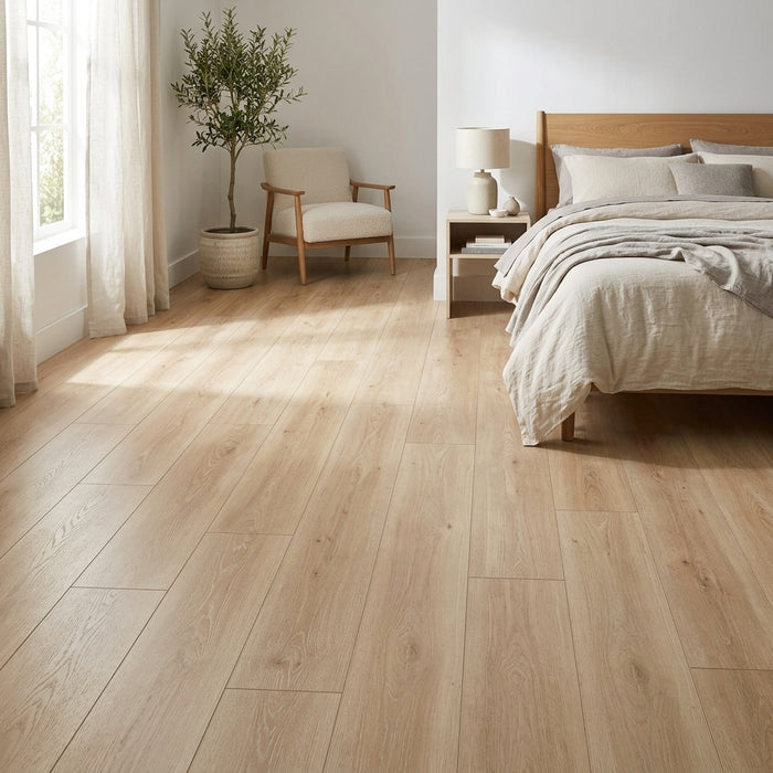 NAF AquaPlus Select Sauble Beach 7mm waterproof rigid core vinyl plank flooring with realistic wood grain and deep-textured finish applied in a bedroom