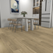 NAF AquaPlus Select Tobermory 7mm waterproof rigid core vinyl plank flooring with realistic wood grain and deep-textured finish in dining room