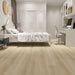 NAF AquaWood Thames 10mm waterproof WPC vinyl plank flooring with wide wood-look planks and textured finish in a bedroom