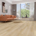 NAF AquaWood Volga 10mm waterproof WPC vinyl plank flooring with wide wood-look planks and textured finish in a living room