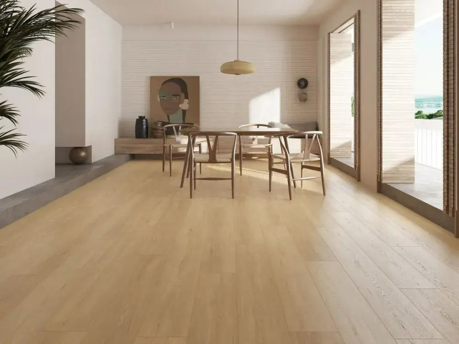 NAF Ariel 12mm waterproof laminate flooring featuring wide 9.3-inch wood-look planks and realistic 4D texture in a dining room