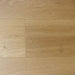 NAF Aurora 12mm waterproof laminate PLUS flooring featuring 9.3-inch-wide planks with detailed 4D wood-grain texture
