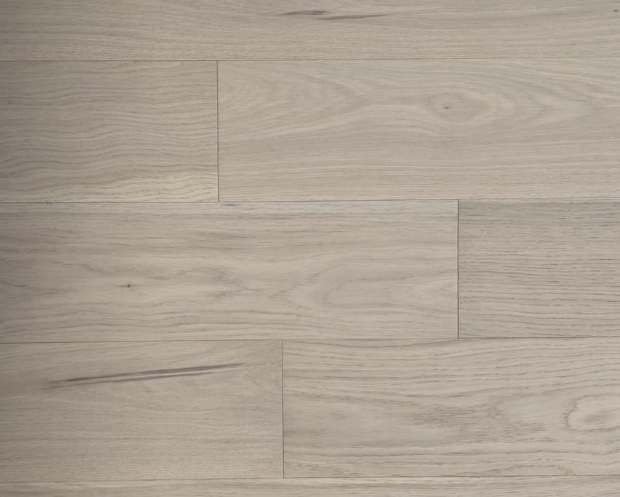 NAF Canvas European white oak engineered hardwood flooring featuring 5-inch planks with natural oak grain and a Select Grade wood appearance