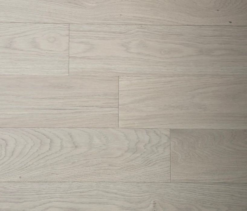 NAF Harvest Gold European White Oak engineered hardwood flooring featuring 5-inch planks with natural oak grain and a wirebrushed finish