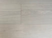 NAF Linen Oak European White Oak engineered hardwood flooring featuring 7.5-inch planks with natural grain and a wirebrushed surface