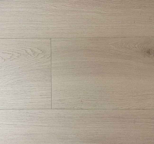 NAF Luna 12mm waterproof laminate PLUS flooring featuring 9.3-inch-wide wood-look planks with realistic 4D texture