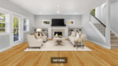 NAF Natural Maple engineered hardwood flooring featuring 6.5-inch planks with natural maple grain and a handscraped surface in a living room