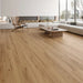 NAF Nova 12mm waterproof laminate PLUS flooring with wide 9.3-inch planks and natural-looking 4D wood-grain texture in a living room
