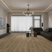 NAF Palisade 14mm waterproof laminate flooring featuring 7.7-inch wood-look planks with a realistic 4D textured finish in a living room