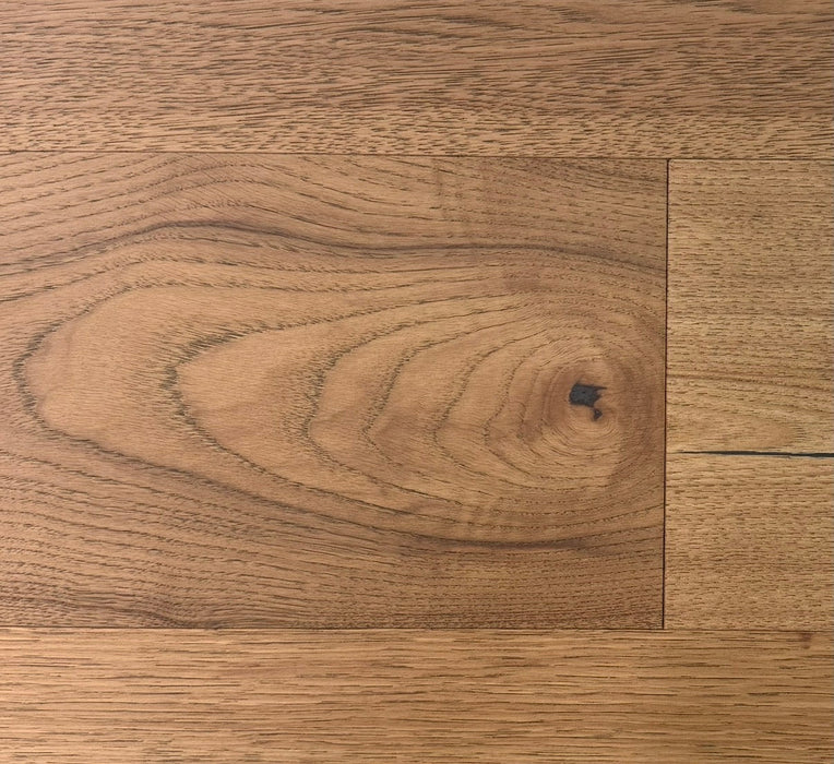 NAF Pecan Hickory engineered hardwood flooring with 7.5-inch wide planks, natural wood grain and a wirebrushed surface