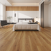NAF Royal Cornwall 8mm waterproof rigid core vinyl plank flooring with realistic wood grain and deep-textured finish in a bedroom