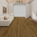 NAF Royal Edinburgh 8mm waterproof rigid core vinyl plank flooring with realistic wood grain and deep-textured finish in a living room