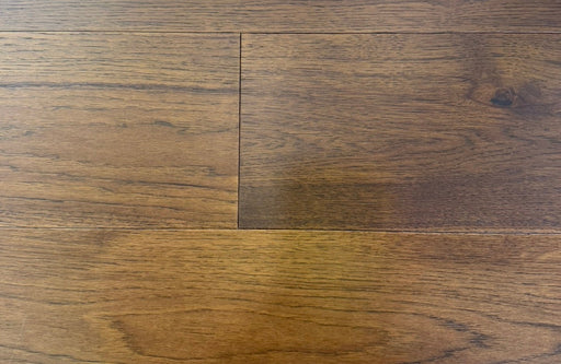 NAF Saddle Brown Hickory engineered hardwood flooring with 7.5-inch wide planks, natural wood grain and a wirebrushed surface