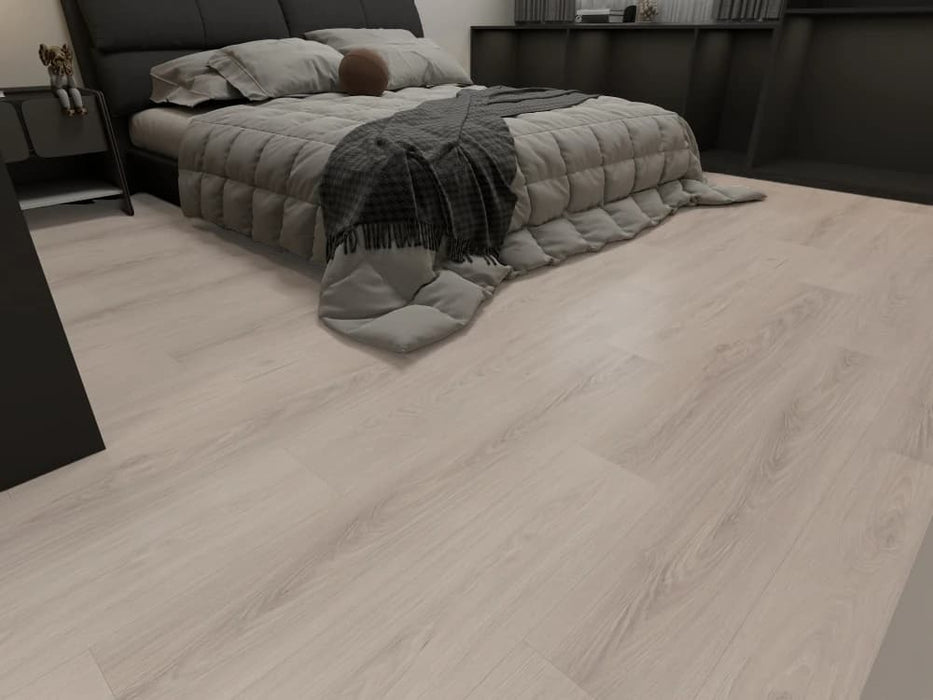 NAF Silver Dune 14mm waterproof laminate flooring featuring 7.7-inch wood-look planks with a realistic 4D textured finish in a bedroom
