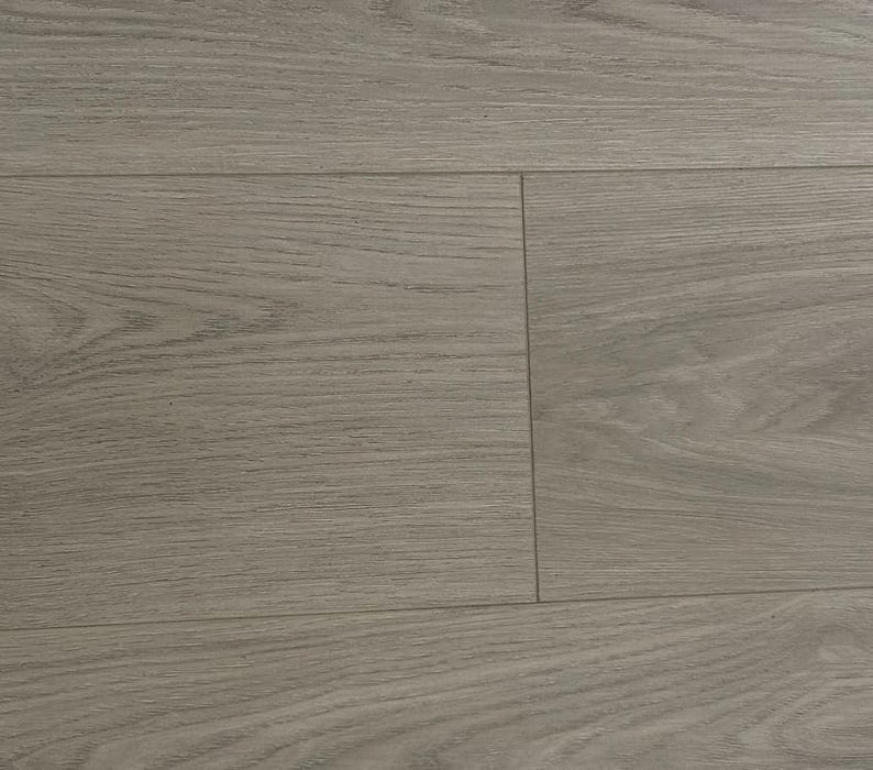 NAF Silver Dune 14mm waterproof laminate flooring featuring 7.7-inch wood-look planks with a realistic 4D textured finish