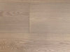 NAF Soft Gold European White Oak engineered hardwood flooring featuring 7.5-inch planks with natural grain and a wirebrushed surface