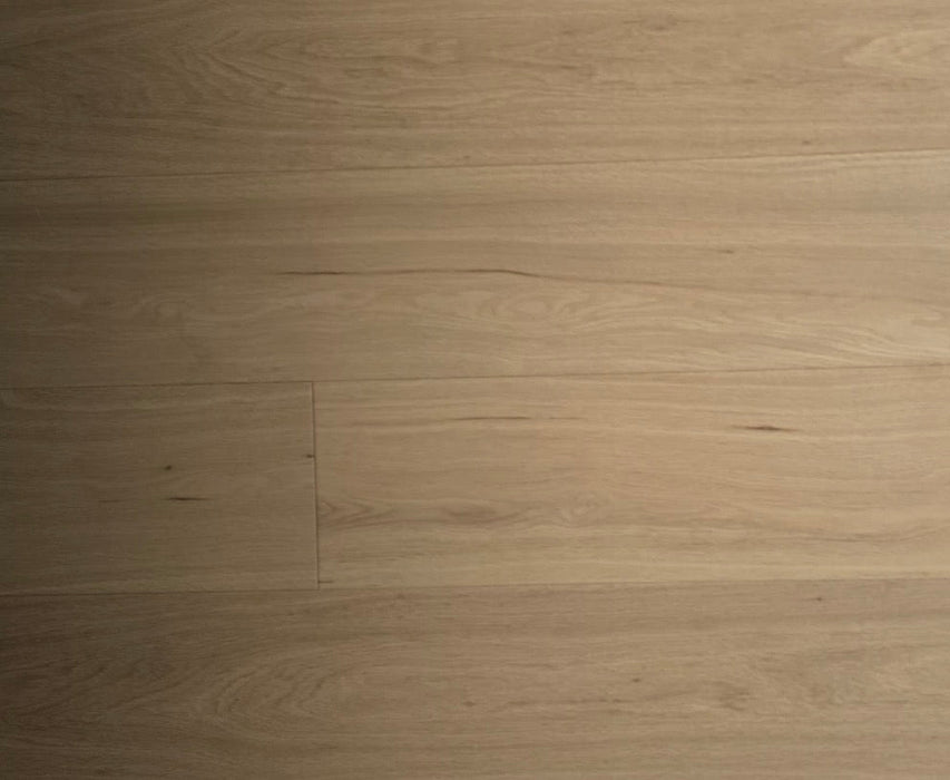 NAF Truffle White Oak engineered hardwood flooring with 7.5-inch wide planks and natural oak grain with a wirebrushed texture