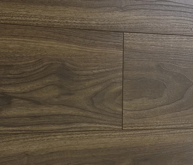NAF Urban Walnut 14mm waterproof laminate flooring featuring 7.7-inch wood-look planks with a realistic 4D textured finish
