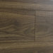 NAF Urban Walnut 14mm waterproof laminate flooring featuring 7.7-inch wood-look planks with a realistic 4D textured finish