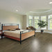 Toucan Brownstone 7.70" Water Resistant EIR laminate flooring in bedroom